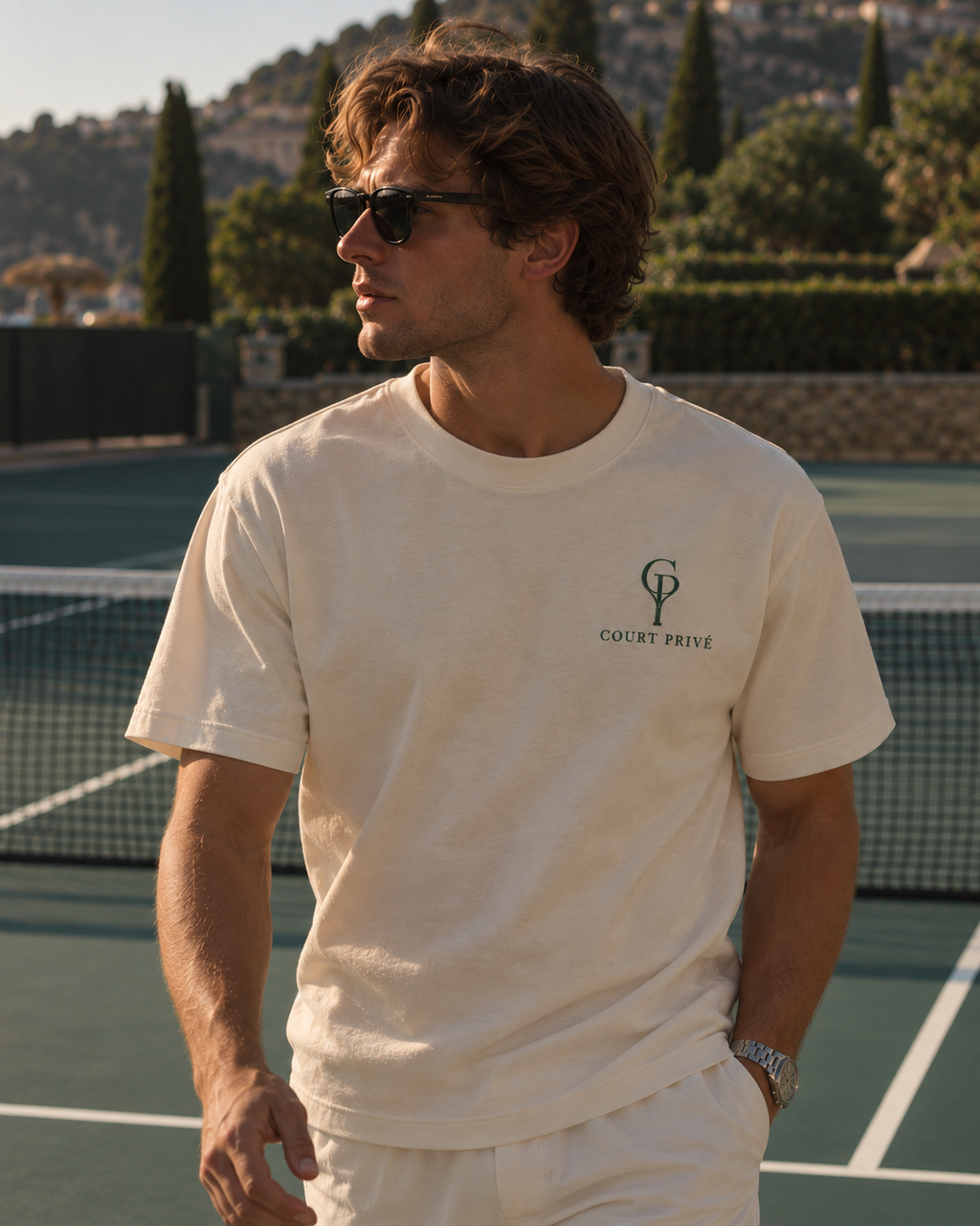 Privé Tee lifestyle model on tennis court